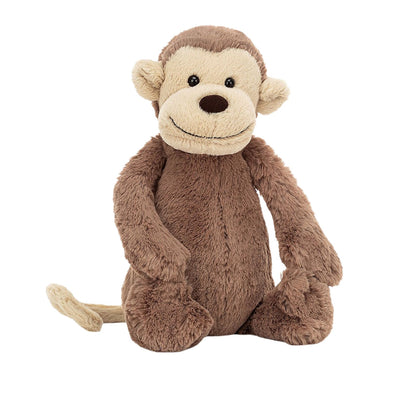 Jellycat Bashful Monkey has an adorable smile and a brown body with tan colored face, ears and tail. 