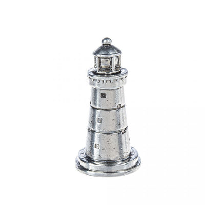 This is a photo of a small zinc lighthouse trinket charm. 