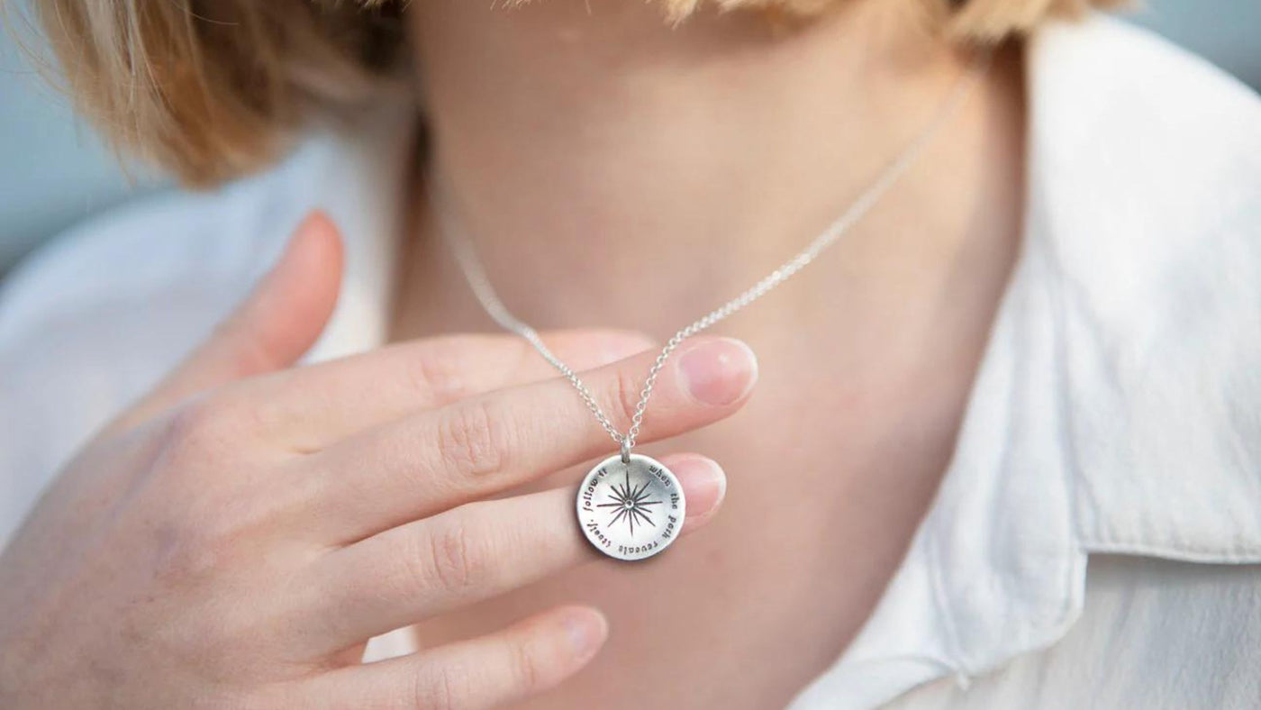 Woman Showing Disc Charm Necklace 