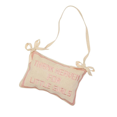 Thank Heaven for Little Girls Door Hanger Pillow is cream colored with pink embroidery.